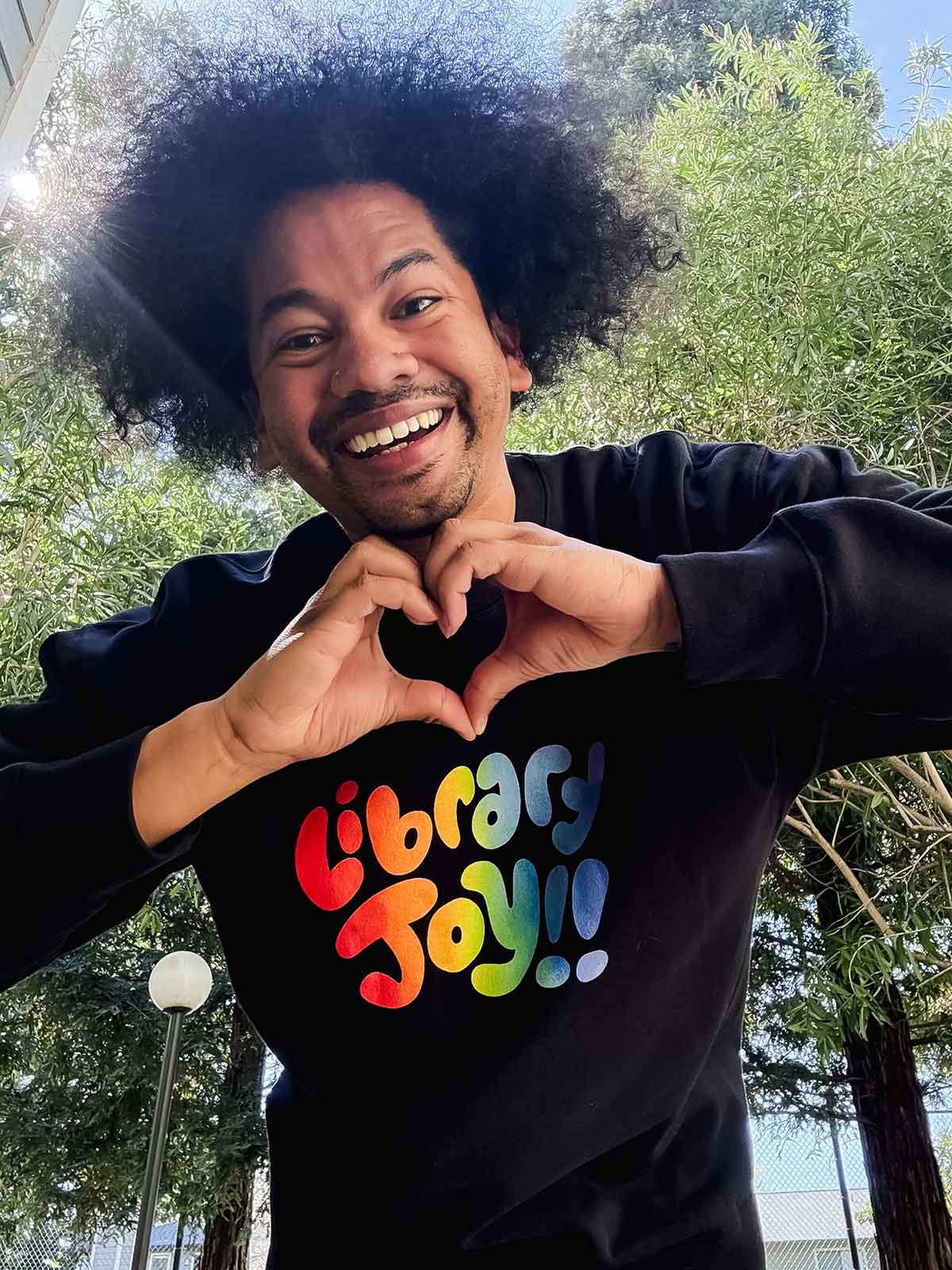 Mychal Threets: Library Joy Unisex Sweatshirt (Print Shop) - Image 2