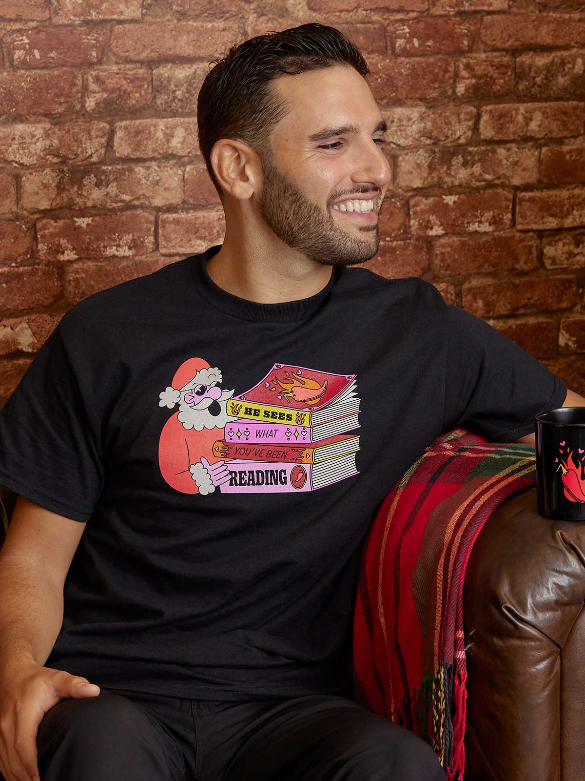 Santa: He Sees What You've Been Reading Unisex T-Shirt - Image 2